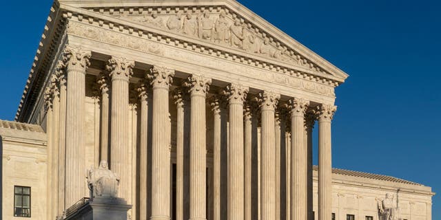 FILE - In this April 20, 2018, file photo, the Supreme Court is seen in Washington. (AP Photo/J. Scott Applewhite, File)