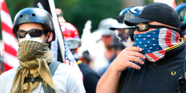 Patriot Prayer supporters march in Portland, Ore., June 30, 2018.