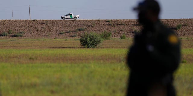 In this Aug. 11, 2017, file photo, U.S. Customs and Border Patrol agents patrol for immigrants suspected of crossing into the United States illegally along the Rio Grande near Granjeno, Texas.