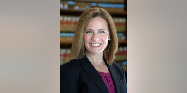 This 2017 photo provided by the University of Notre Dame Law School in South Bend, Ind., shows Judge Amy Coney Barrett. Barrett is one of the top contenders to replace late Justice Ruth Bader Ginsburg on the Supreme Court. (Notre Dame via AP)