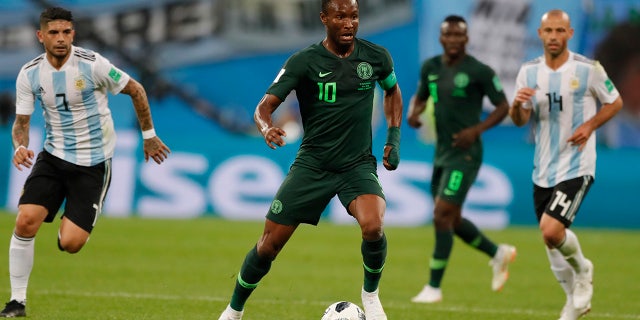 Nigeria captain John Obi Mikel controls the ball during a match against Argentina.