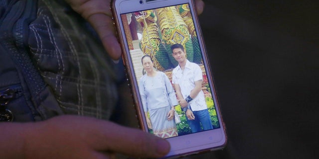Coach Ekapol Chantawong trained with Buddhist monks for a decade after his family was killed by a disease. Friends say Ekapol, who became trapped in the Thailand cave along with 12 young members of the soccer team in June, “loves the boys more than he loves himself.”