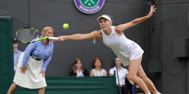 No. 2 Caroline Wozniacki was defeated at Wimbledon Wednesday by Ekaterina Makarova of Russia in the second-round match.