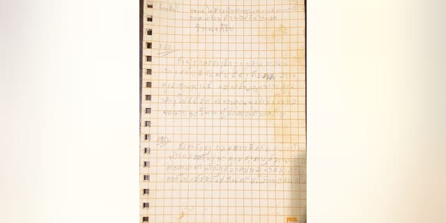 An undated photo shows handwritten notes by one of the children and their coach trapped in a cave in Mae Sai, Thailand.