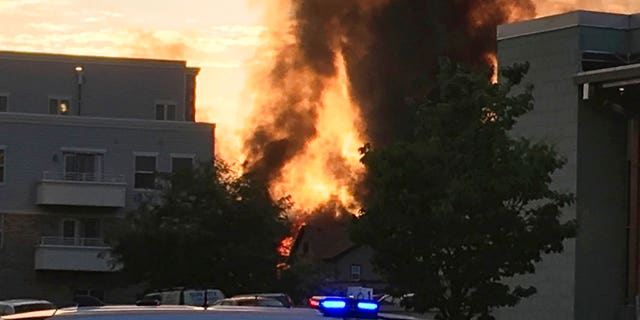 A large plume of smoke from a massive fire is seen in Sun Prairie, Wis., Tuesday.