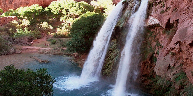 This 1997 file photo shows one of five waterfalls on Havasu Creek as its waters tumble 210 feet on the Havasupai Tribe's reservation in a southeastern branch of the Grand Canyon near Supai, Ariz.