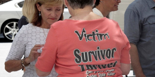 Jane Carson-Sandler, of South Carolina, wears a T-shirt with a message to her alleged attacker, in Sacramento, Calif., July 12, 2018.