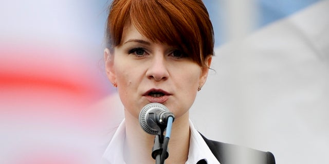 In this photo, Maria Butina, leader of a pro-gun organization in Russia, speaks to a crowd during a rally in support of legalizing the possession of handguns in Moscow.