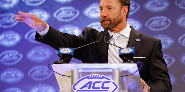 North Carolina head coach Larry Fedora answers a question during a news conference at the NCAA Atlantic Coast Conference college football media day in Charlotte, N.C., Wednesday, July 18, 2018.
