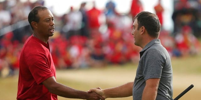 Francesco Molinari of Italy beats out Tiger Woods for the Open Championship.