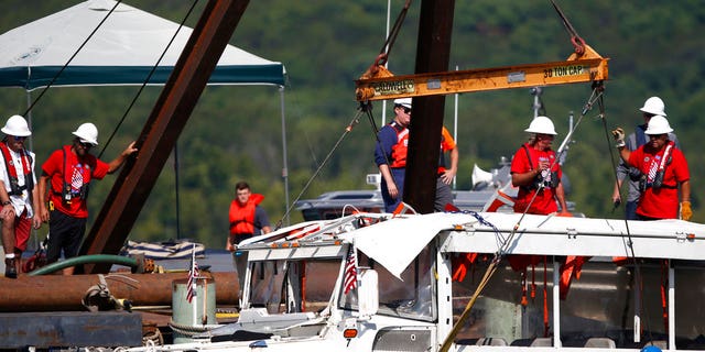 The duck boat that sank in Table Rock Lake in Branson, Mo., was raised four days after the tragedy.