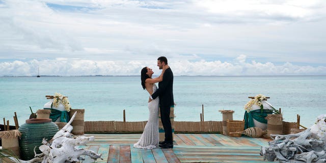 In this undated photo provided ABC, Becca Kufrin embraces Garrett Yrigoyen in an episode of the âThe Bacheloretteâ. Kufrin celebrated her engagement to Yrigoyen, capping the Monday, Aug. 6, 2018, finale on ABC following the usual tears and drama. (Paul Hebert/ABC via AP)