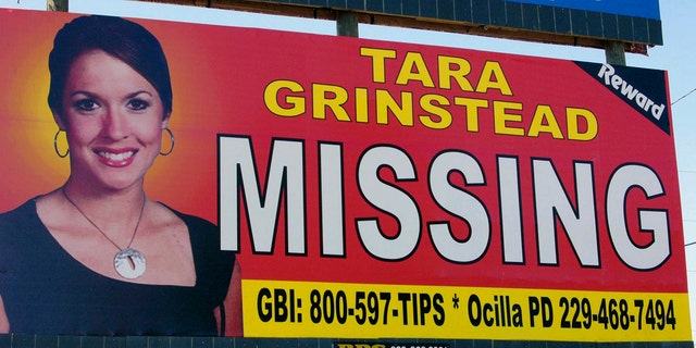 A photo of missing teacher Tara Grinstead is seen on a billboard in Ocilla, Georgia, in 2006.