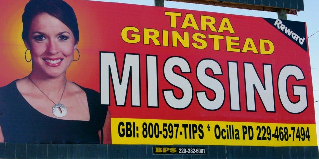 A photo of missing teacher Tara Grinstead is seen on a billboard in Ocilla, Georgia, in 2006.