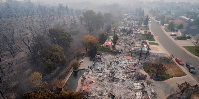 Homes destroyed by a wildfire are seen from an aerial view in the Mary Lake Subdivision in Redding, Calif., Aug. 10, 2018.