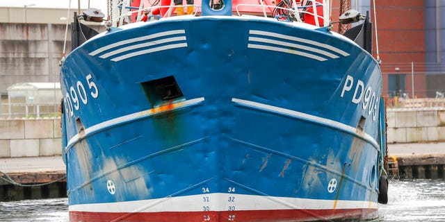 A view of the bow of Honeybourne III, a Scottish scallop dredger, in dock at Shoreham, West Sussex, Wednesday, Aug. 29, 2018 following clashes with French fishermen in the early hours of Tuesday morning in the English Channel during a long-running dispute over the scallop-rich area