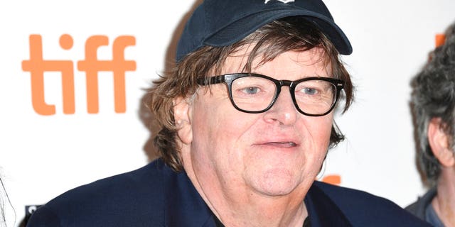 Liberal filmmaker Michael Moore challenges the media: Who will demand we repeal the Second Amendment? 4 Filmmaker Michael Moore at premiere for his Donald Trump-themed documentary,