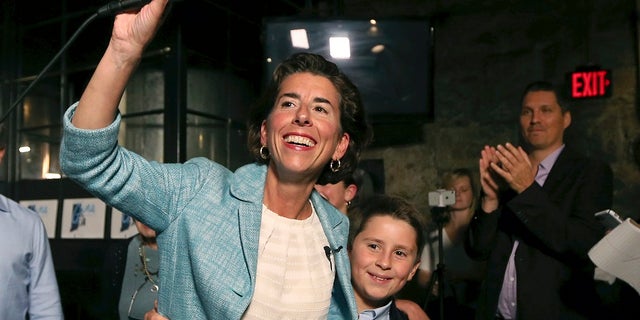 Democratic Rhode Island Gov. Gina Raimondo and her son, Thompson. (Associated Press)