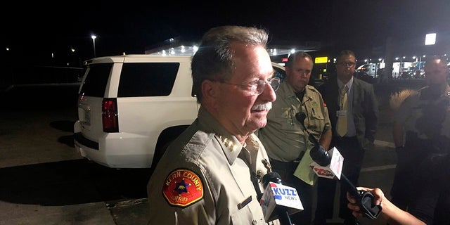 Kern County Sheriff Donny Youngblood talks to the media in southeast Bakersfield, Calif., after authorities said a gunman killed multiple people Wednesday.
