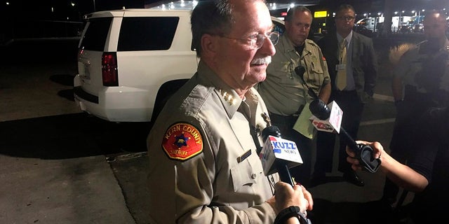 Kern County Sheriff Donny Youngblood talks to the media in southeast Bakersfield, Calif., after authorities said a gunman killed multiple people Wednesday.