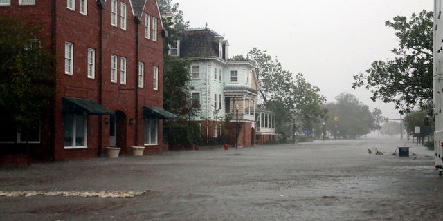 Flooding caused by Hurricane Florence covers blocks of Front Street in downtown New Bern, North Carolina.