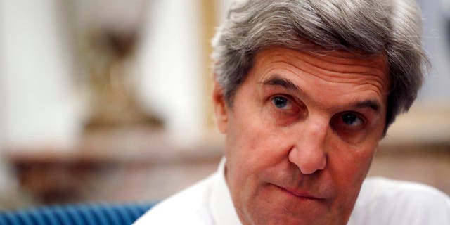 FILE: U.S Secretary of State John Kerry speaks with the media after attending the Mideast peace conference in Paris.