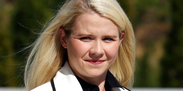 Smart says she’s been “reassured” the woman who helped kidnap her when she was 14 and stood by as she was sexually assaulted will be watched when she’s released from prison.