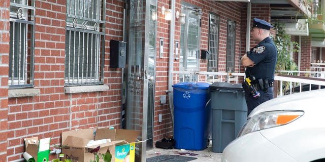 The house were five people were stabbed overnight is seen, Friday, Sept. 21, 2018, in New York.