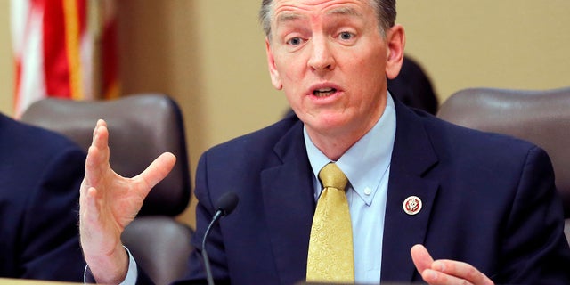 FILE - In this Dec. 2013, file photo, U.S. Rep. Paul Gosar, R-Ariz., speaks during a Congressional Field Hearing on the Affordable Care Act in Apache Junction, Ariz. Six siblings of Gosar have urged voters to cast their ballots against the Arizona Republican in November 2018 in an unusual political ad sponsored by the rival candidate. The television ad from Democrat David Brill combines video interviews with Gosar-family siblings who ask voters to usher Paul Gosar out of office because he has broken with the familyâs values. They do not elaborate. (AP Photo/Matt York, File)