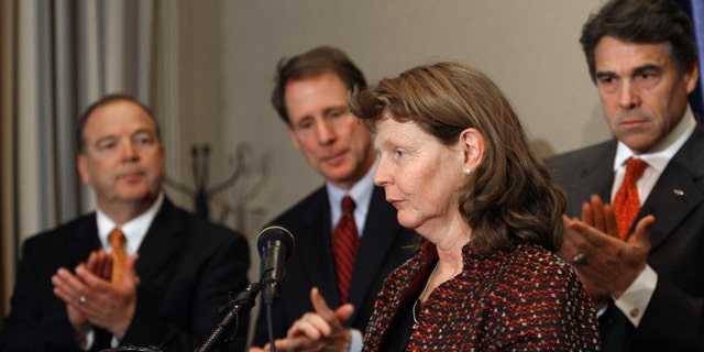 Jan. 22, 2009: Susette Kelo is applauded before speaking at a news conference in Austin, Texas. with, left to right: Rep. Rob Orr, R-Burleson; Sen. Robert Duncan, R-Lubbock; Texas Gov. Rick Perry. Kelo was the lead plaintiff in Kelo v. City of New London, Connecticut, where the U.S. Supreme Court ruled that private property can be taken through eminent domain for economic development projects.