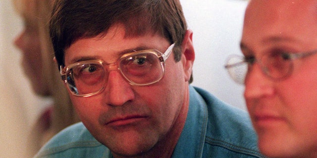 Eugene de Kock, the head of a covert police unit that tortured and killed dozens of people, attends an amnesty hearing of the Truth and Reconciliation Commission in 1998.