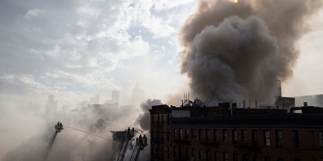 Smoke rising from the fire and building collapse in March 2015.