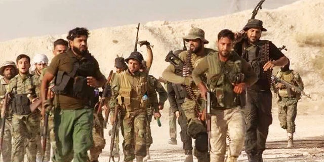 U.S.-backed Syrian rebels of the New Syrian Army, in a photo released Tuesday.