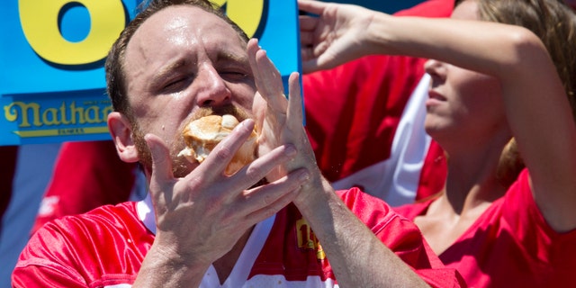 Joey Chestnut wolfing down hot dogs on July 4, 2016.