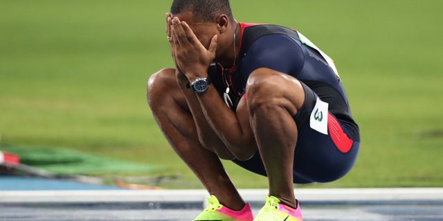 France's Wilhem Belocian reacts after being disqualified for a false start during the athletics competitions of the 2016 Summer Olympics at the Olympic stadium in Rio de Janeiro, Brazil, Monday, Aug. 15, 2016. (AP Photo/Lee Jin-man)
