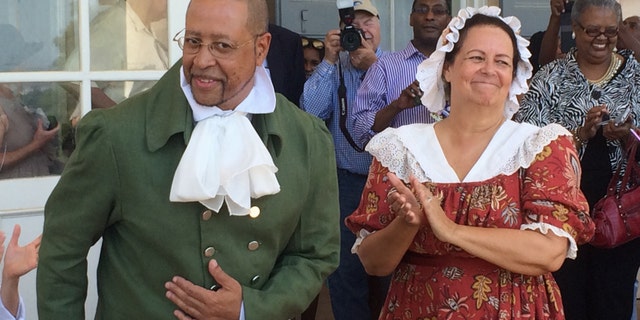 Craig Syphax and Donna Kunkel portray their ancestors at a June re-enactment of the 1821 wedding of slaves Charles Syphax and Maria Carter at Arlington House, the estate once owned by George Washington's adopted son, George Washington Parke Custis.