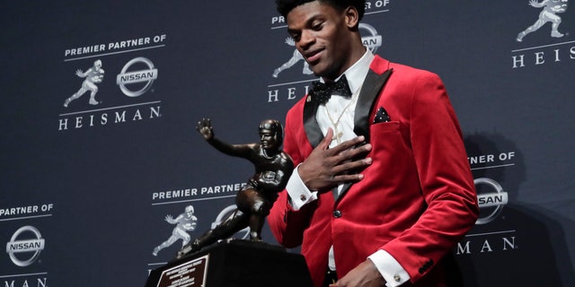 Louisville's Lamar Jackson winning the Heisman Trophy award Saturday.