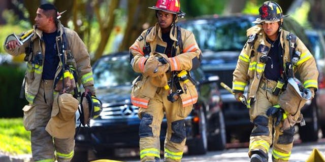 Houston firefighters at the scene.