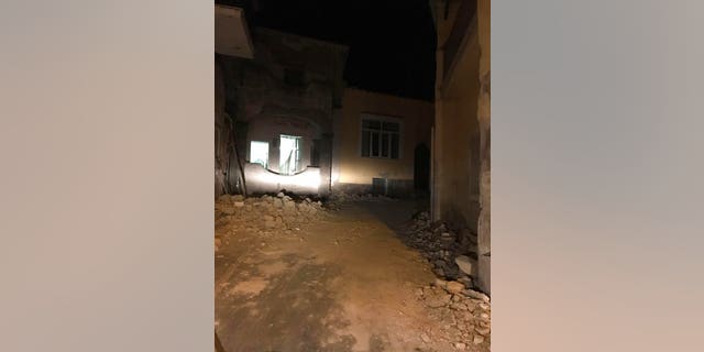 Debris on a road after an earthquake hit the island of Ischia, near Naples, Southern Italy, Monday.