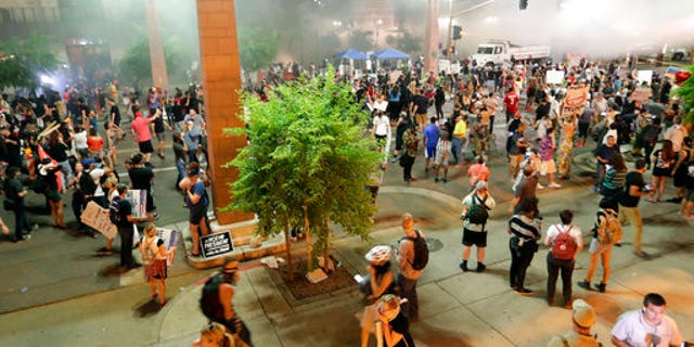 Protesters outside the Phoenix Convention Center on Tuesday.