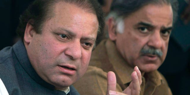 Pakistan's Prime Minister Nawaz Sharif, left, shown with his brother, Shahbaz Sharif, has pledged to protect religious minorities.