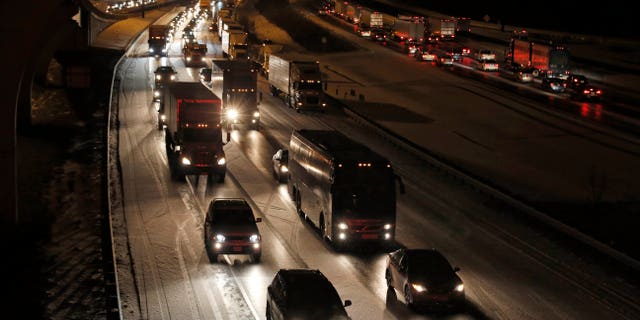 Bumper-to-bumper traffic on the outer loop of the I-495 Capital Beltway after snow fell Wednesday.