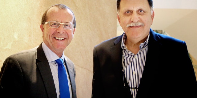U.N. special envoy for Libya Martin Kobler, left, is greeted in Cairo by Fayez Serraj, Libyan designated-prime minister and head of the presidential council, in February.