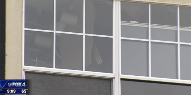 Damage visible from the outside after the floor collapsed at a North Texas apartment complex during a party.