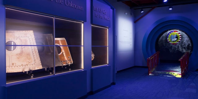 This Tuesday, Jan. 24, 2017 photo provided by NASA shows part of the Apollo 1 exhibit at the Kennedy Space Center in Titusville, Fla. On Jan. 27, 1967, a fire during a test on the launch pad killed three astronauts at the start of the Apollo moon program. (Kim Shiflett/NASA via AP)