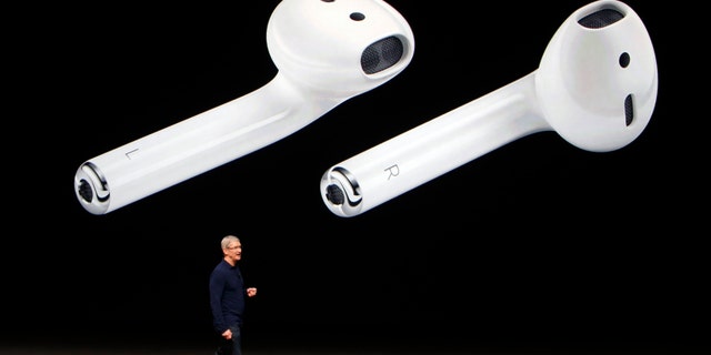 File photo - AirPods are displayed as Apple Inc CEO Tim Cook makes his closing remarks during an Apple media event in San Francisco, California, U.S. Sept. 7, 2016. (REUTERS/Beck Diefenbach)