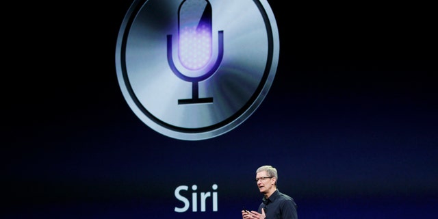 Apple CEO Tim Cook talks about Siri during an Apple event.