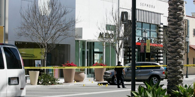 April 4, 2011: Police block off an area by the Apple Store at the Otay Ranch Town Center in Chula Vista, Calif.