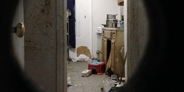 The dirty apartment where a 5-year-old boy was found Friday by a FedEx employee.