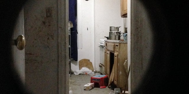 The dirty apartment where a 5-year-old boy was found Friday by a FedEx employee.